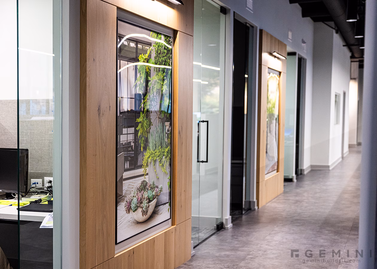 Oversized framed landscape photography installed throughout Mariani Design Studio